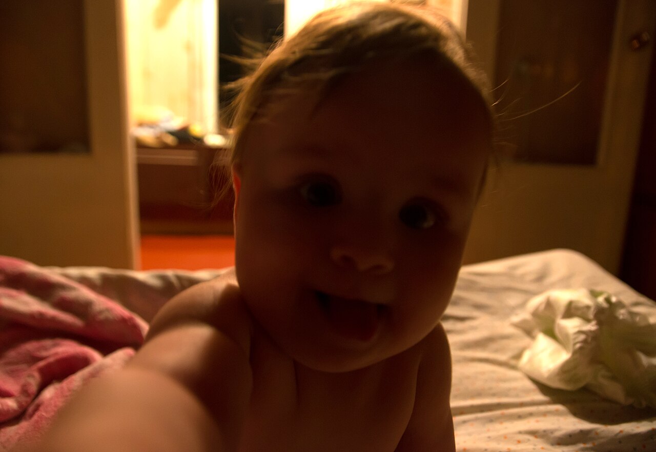 A smiling infant expressing joy