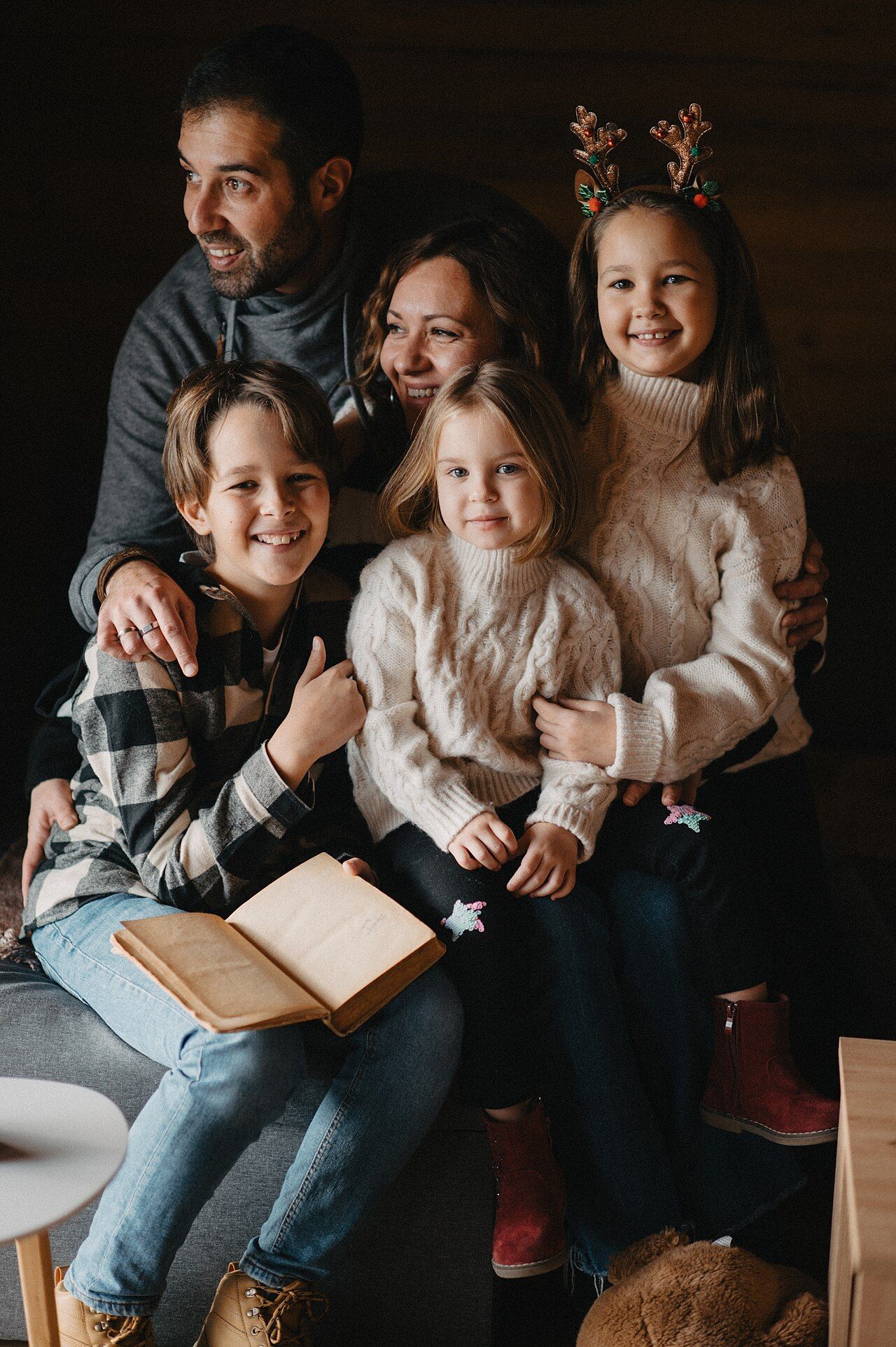 A family gathered together indoors