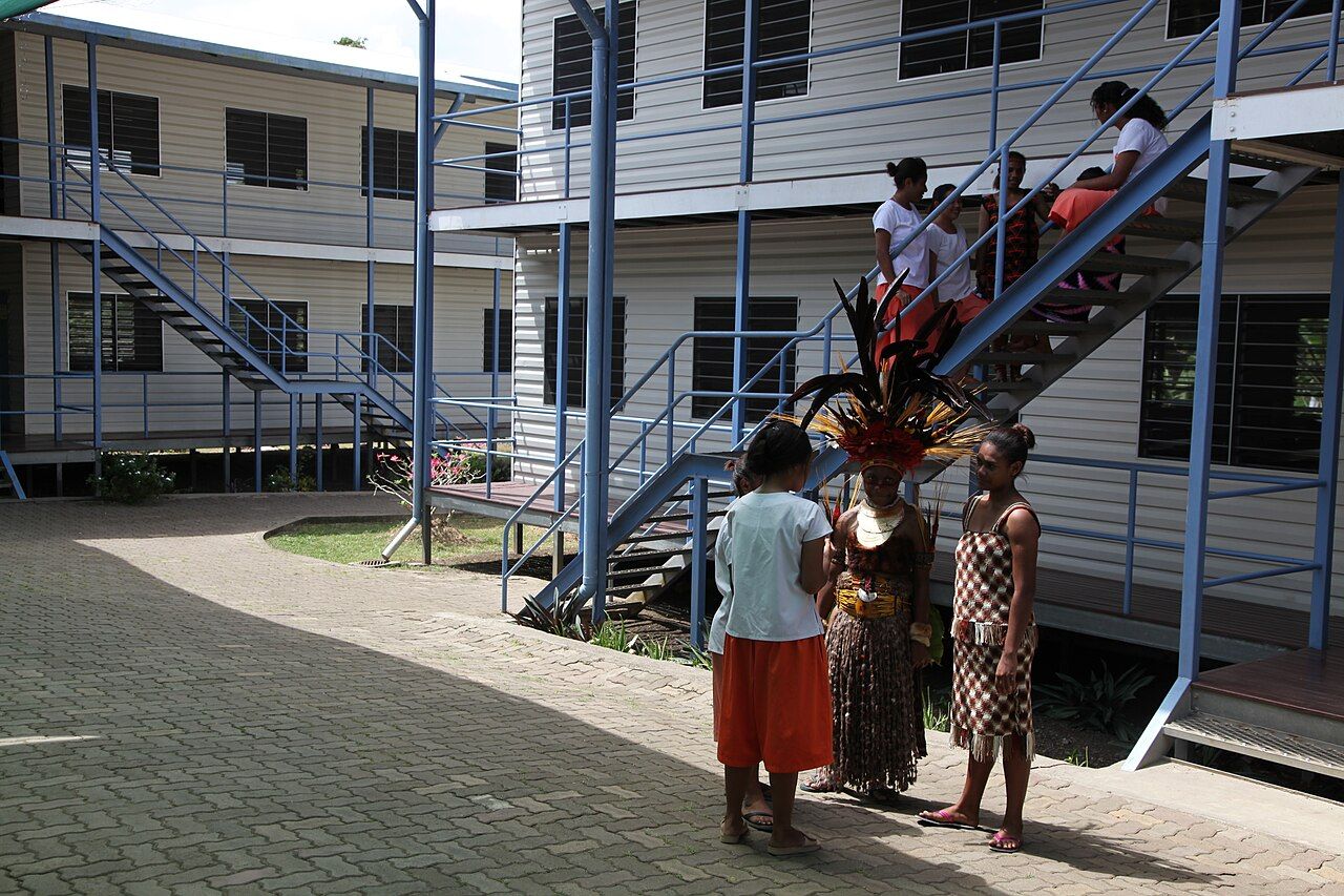 A secondary-school classroom filled with students at their desks